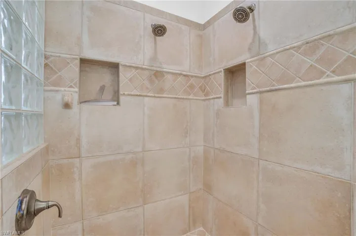 Interior details with a tile shower