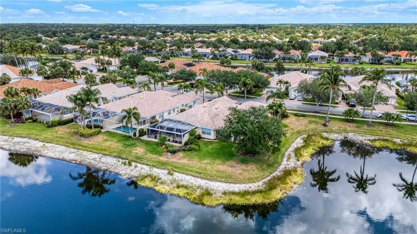 Aerial view of residential area with a nearby body of water