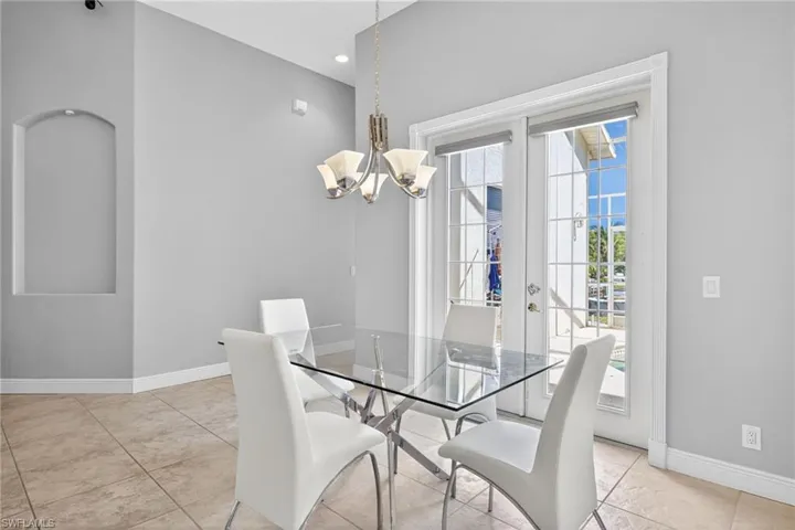 Room featuring tile flooring and a recessed wall niche with accent lighting