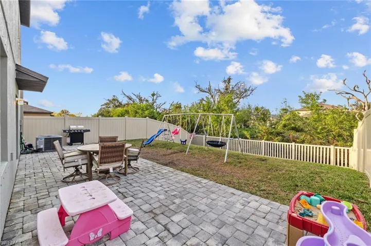 View of patio / terrace with a playground and grilling area
