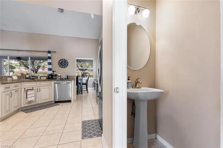 Bathroom with tile patterned floors