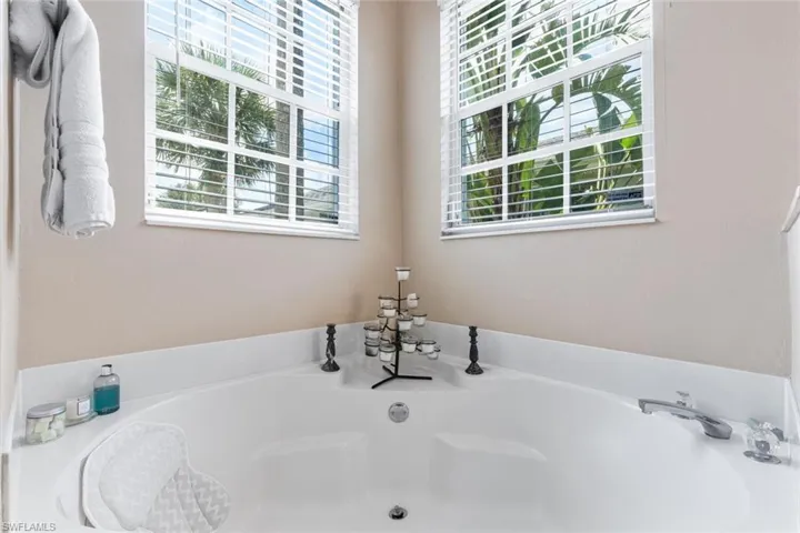 Full bathroom featuring a garden tub