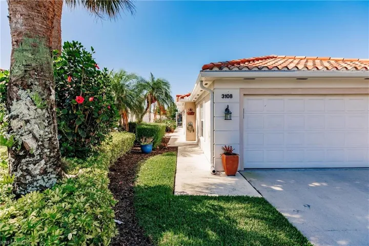 Attractive landscaping greets you.