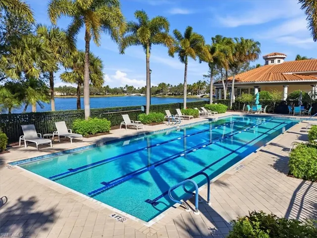 Community pool with a patio area