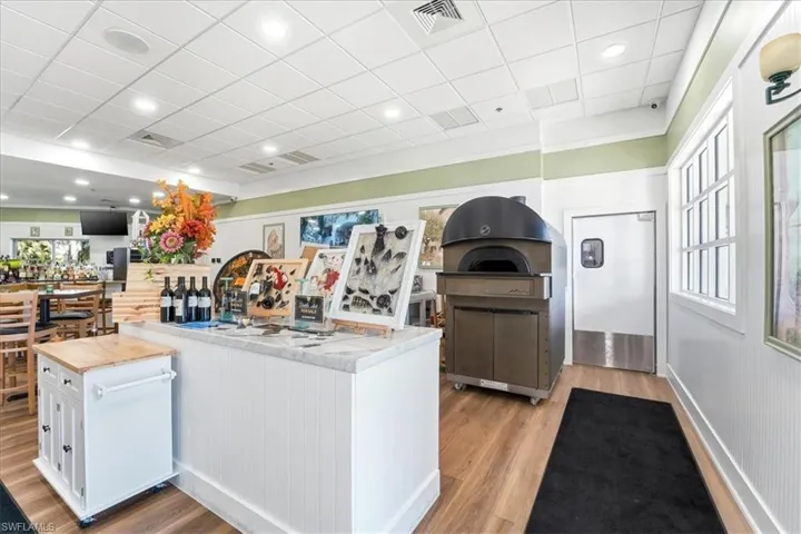 Miscellaneous room featuring a drop ceiling, plenty of natural light, and recessed lighting