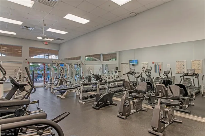 Work out room with lots of equipment