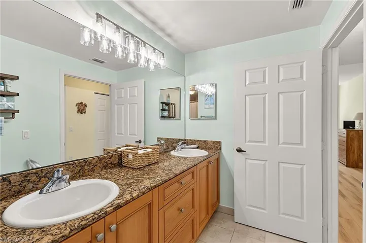 10110 Villagio Palms Way 107, Estero, Florida 33928