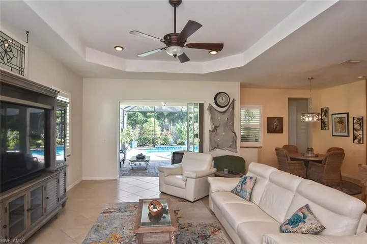 Great Room with tile flooring and sliders to the Lanai