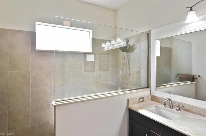 Primary Ensuite' with large tiled walk-in shower