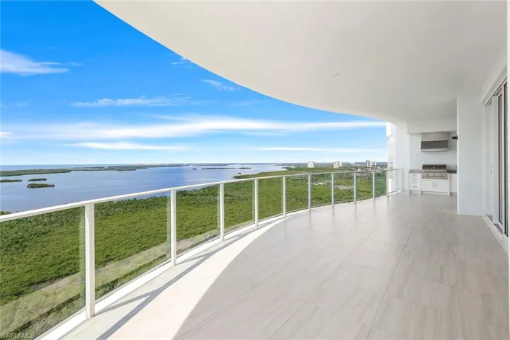 Large Seating area with Built In Gas Grill & Cabinetry