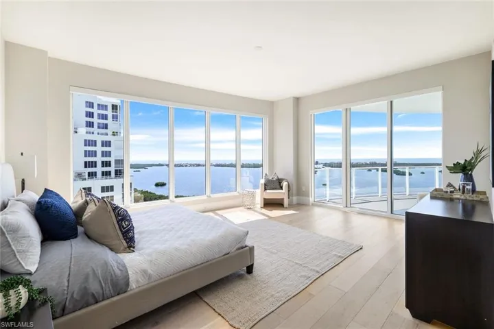 Primary Suite Overlooking Estero Bay with slider access to Balcony