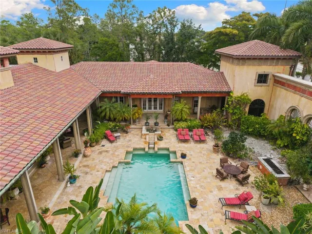 Mediterranean-inspired architecture featuring a terracotta-tiled roof and exterior stucco finish