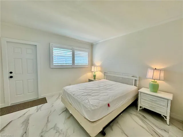 Bedroom featuring ornamental molding