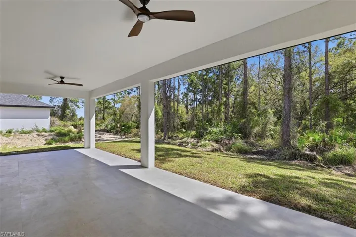 View of patio featuring ceiling fan