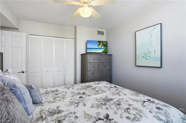 Bedroom featuring a closet and a ceiling fan