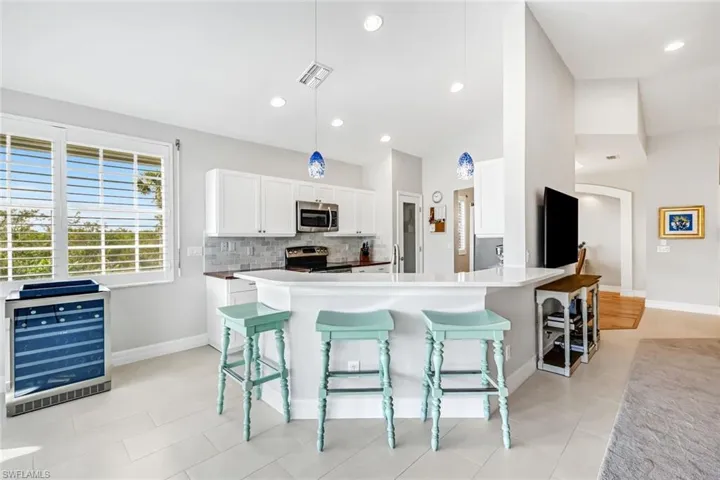 Open to Lanai & Family Room....