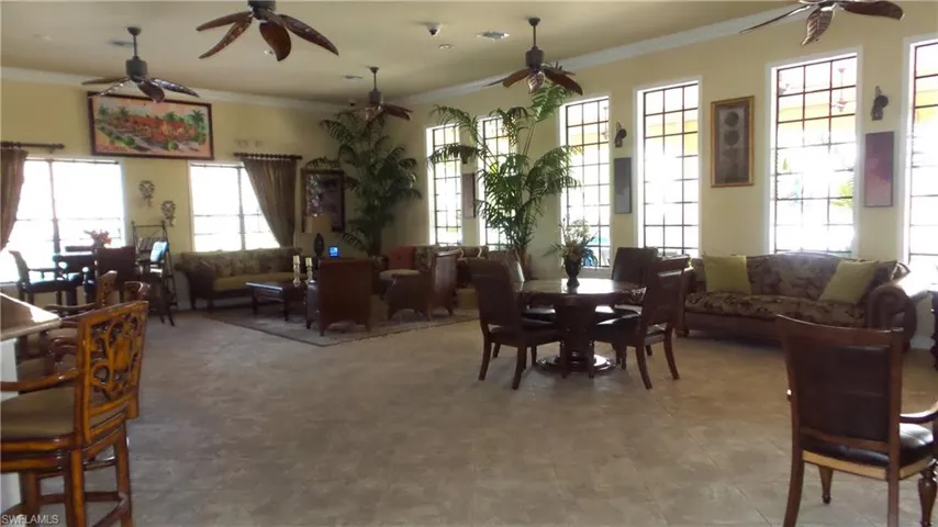 Dining space featuring crown molding and ceiling fan