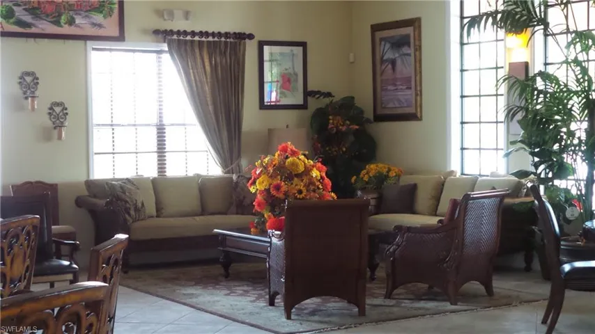 Sitting room featuring healthy amount of natural light and tile patterned flooring