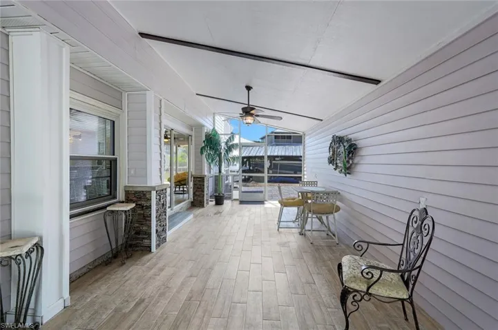 View of patio with ceiling fan