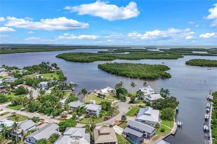 Aerial view of residential area with a nearby body of water