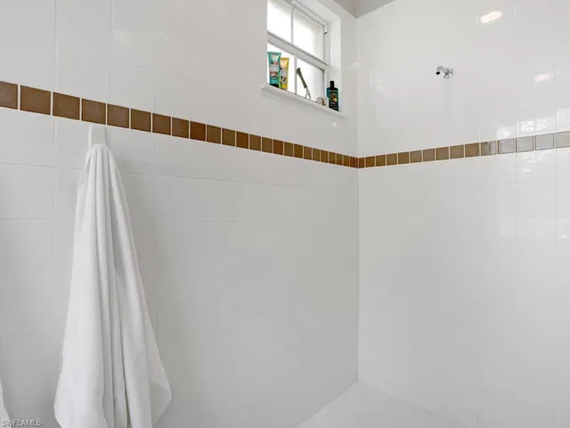 Bathroom with a tile shower
