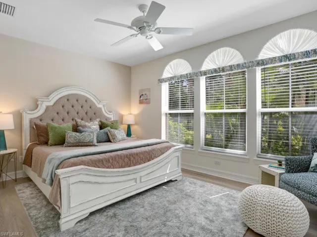 Bedroom featuring a ceiling fan and wood finished floors