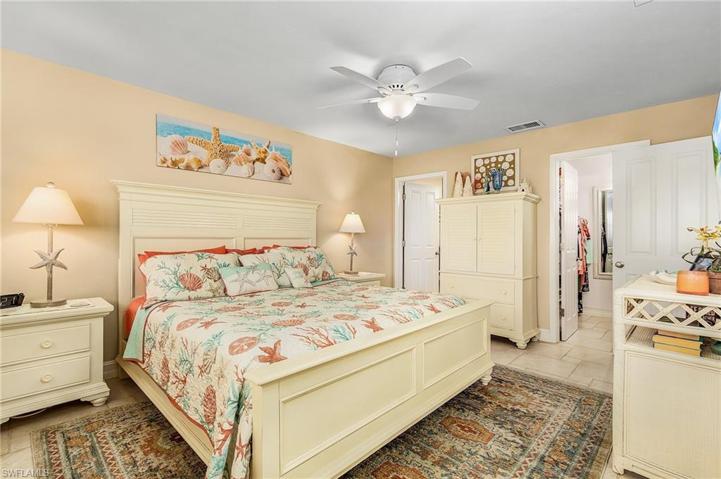 Large primary bedroom with ensuite bath and walk-in closet.