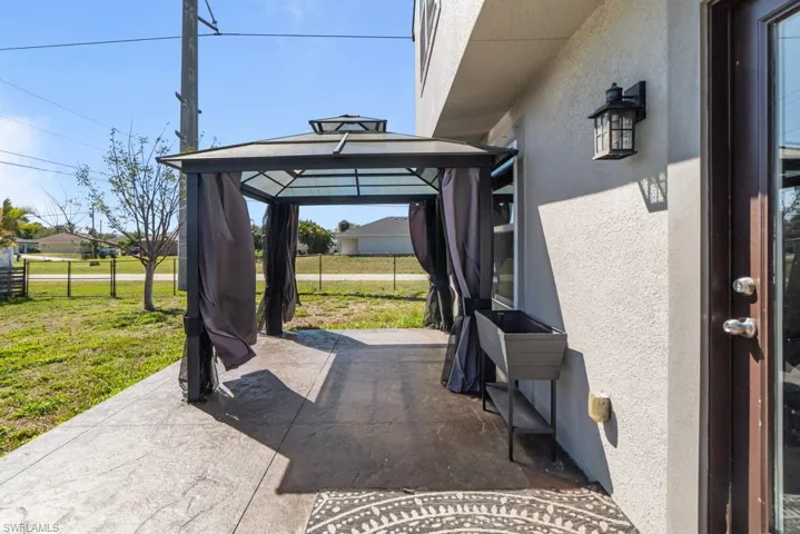View of patio / terrace featuring a gazebo