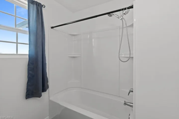 Bathroom with washtub / shower combination