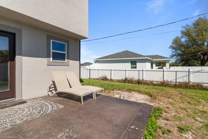 Fenced backyard featuring a patio area