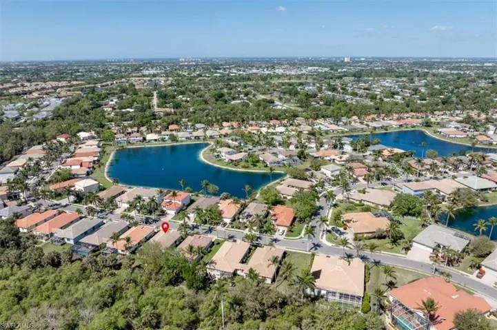 Drone / aerial view featuring a residential view and a water view