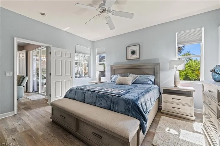 Master Bedroom featuring ceiling fan, baseboards, and wood finished floors