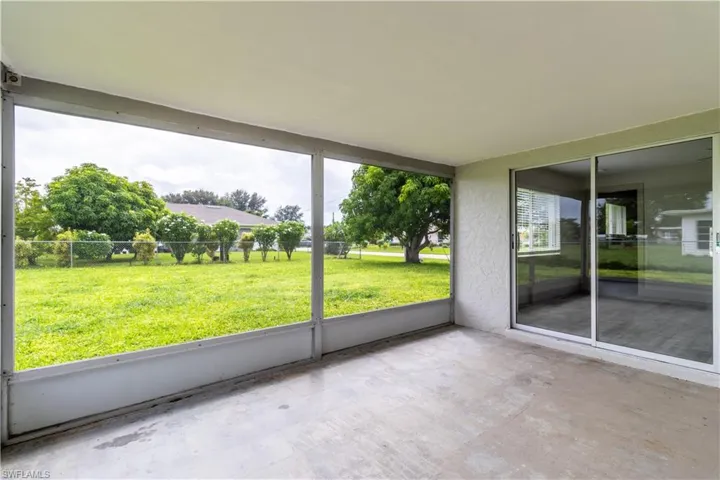 Unfurnished sunroom featuring a wealth of natural light