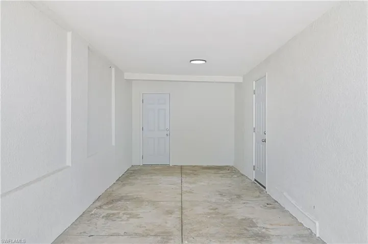 large deep carport to the utility