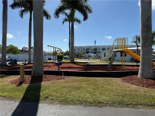 Community play area with a lawn