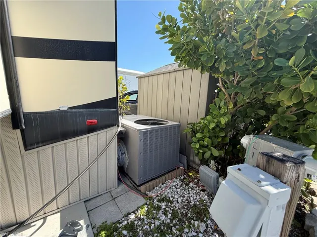 View of patio / terrace featuring a shed
