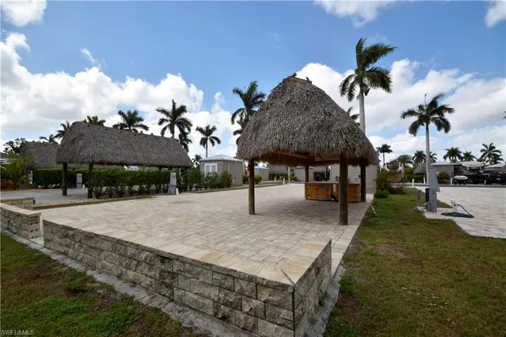 View of property's community featuring a gazebo and a yard