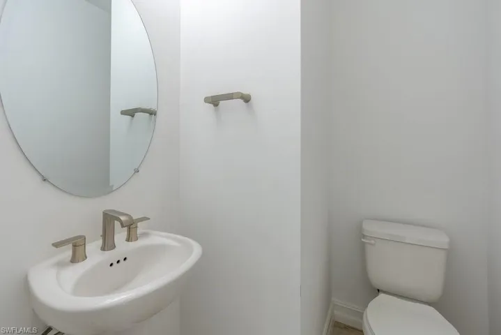 Bathroom with a sink and toilet