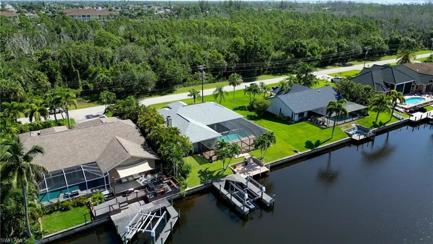 Aerial view of residential area with a large body of water