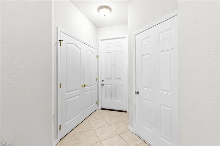 entrance- door to right garage, left, pantry