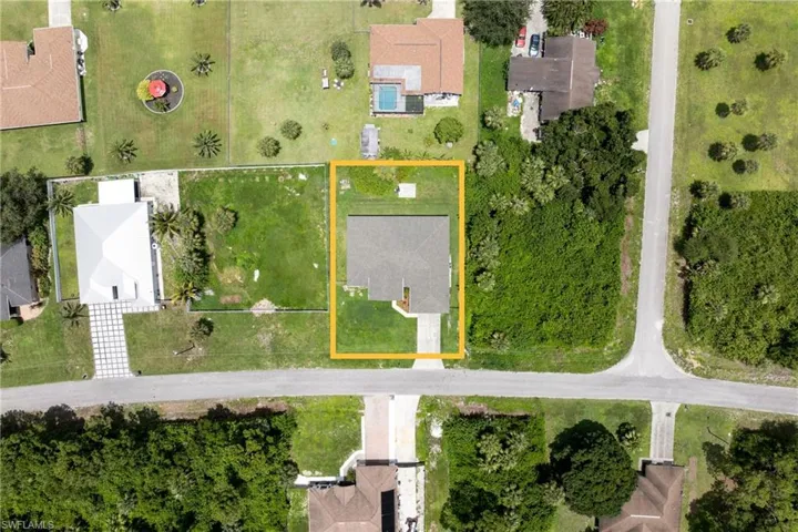 Aerial overview of property's location featuring property parcel outlined