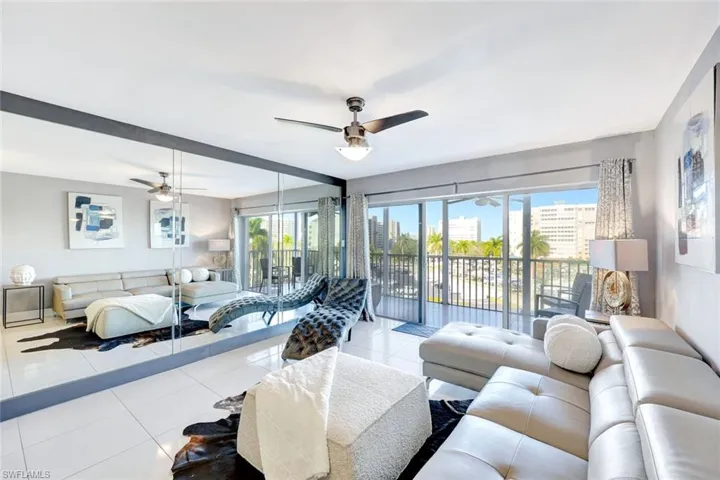 Tiled living room with ceiling fan