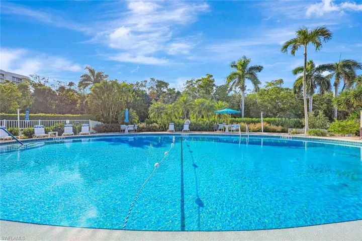 Community pool featuring a patio area