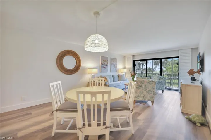 Dining space featuring wood finished floors