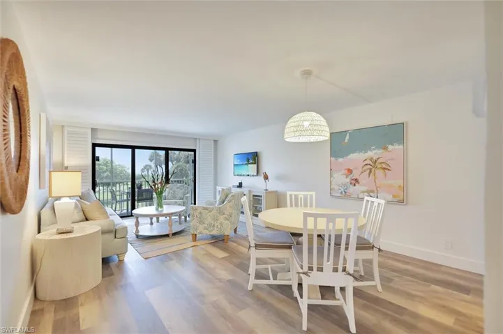 Dining space with wood finished floors