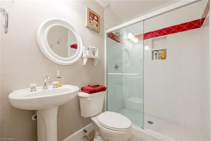Bathroom with toilet and a shower stall