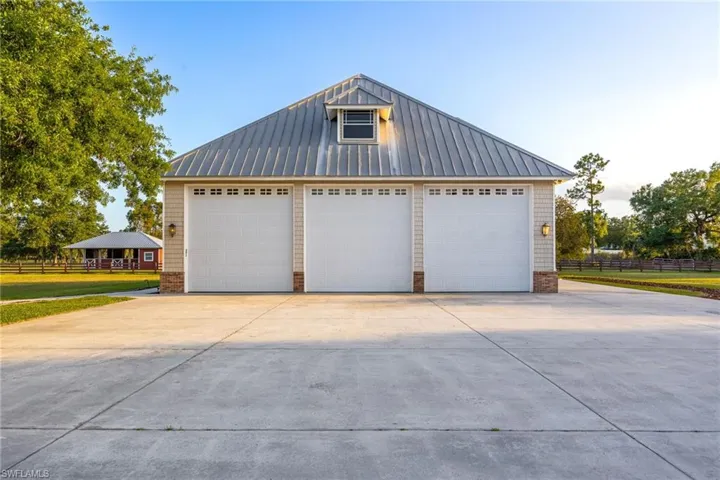 Detached garage with fence
