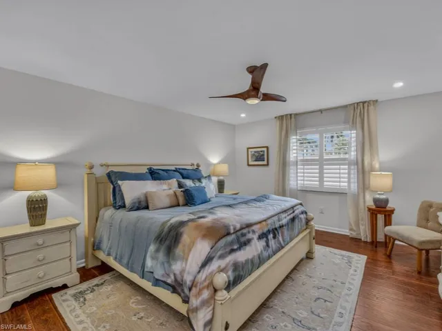 Another view of Master Bedroom, again with wood floors, recessed lighting, and freshly skimmed and painted ceiling and walls