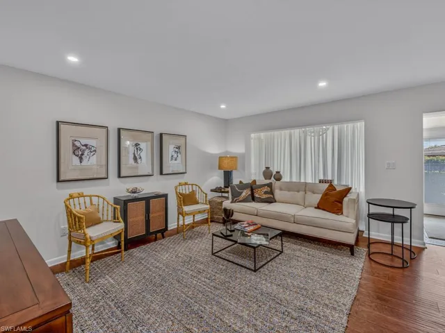 Welcome to #104 a ground floor condo, walk right into your fully furnished main living space featuring wood finished floors and recessed lighting. Nice and bright.