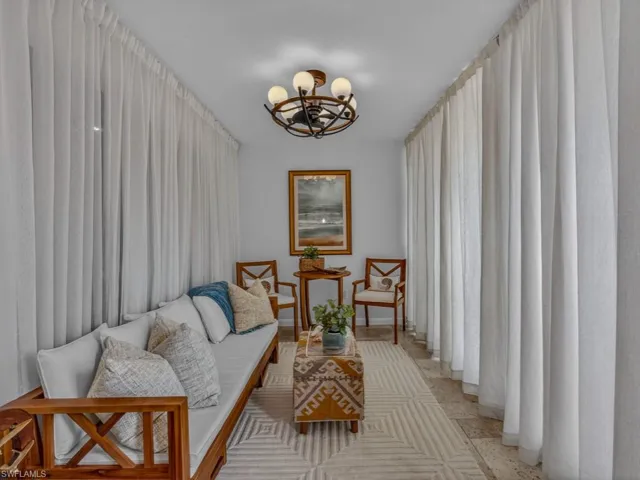 Close the curtains and this room can double as extra sleeping with an expandable sofa.